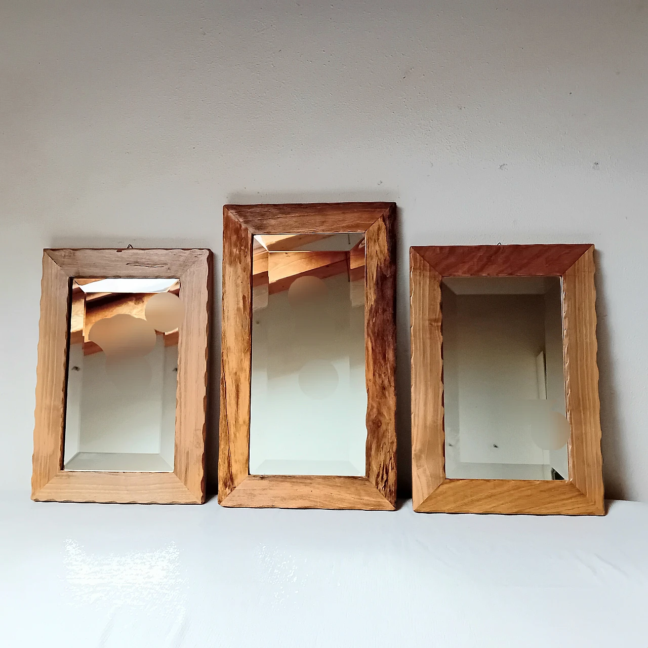 3 Mirrors with bevelled glass and carved wooden frame, 1980s 1