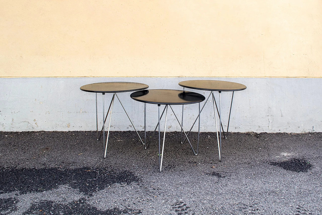 3 Round black lacquered and chromed metal coffee tables, 1980s 2