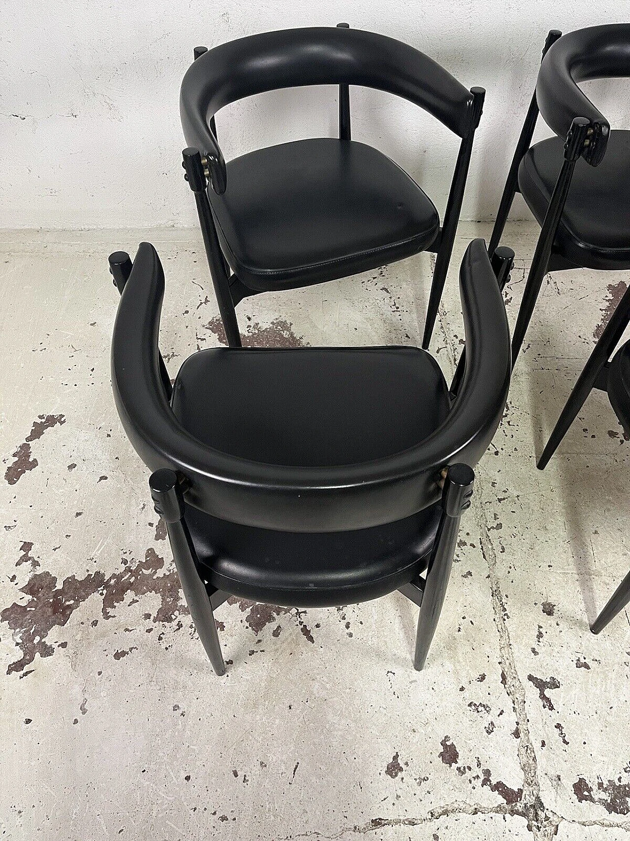 4 Black stained wood and leather chairs, 1970s 11