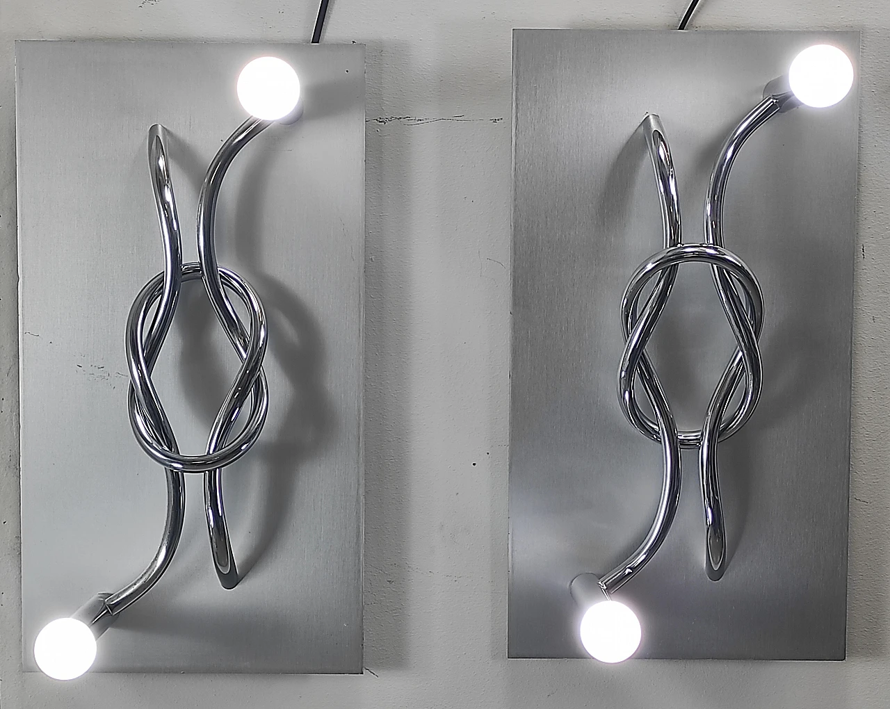 Pair of aluminium and chrome wall sconces by Giacomo Benevelli, 1970s 1