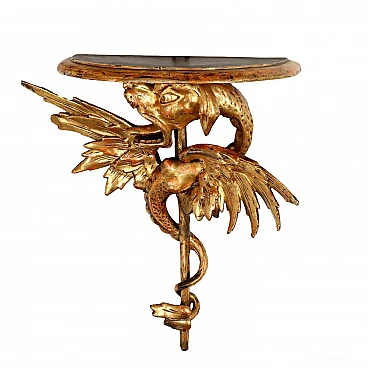 Carved and gilded wooden shelf with dragon figure