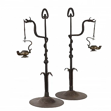 Pair of bronze oil lanterns with snake-shaped stand