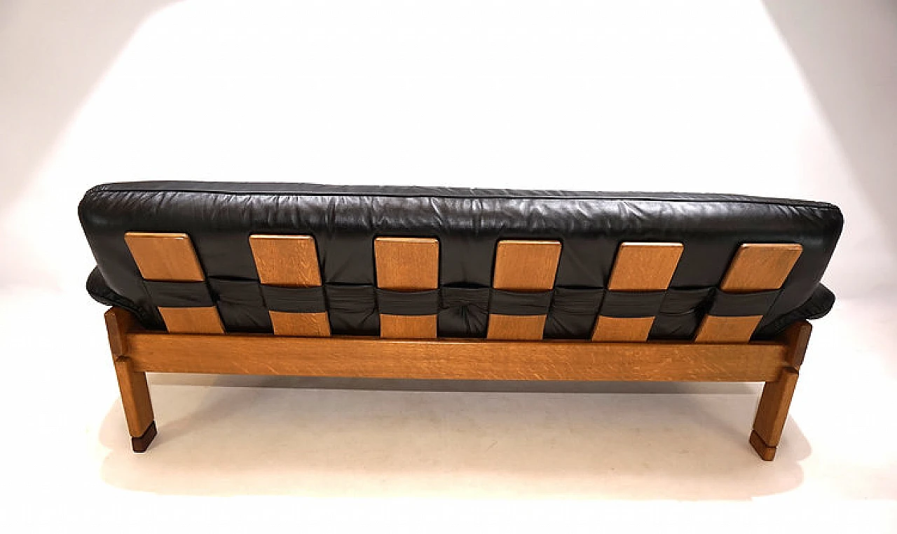 Solid oak and black leather three-seater sofa, 1960s 3