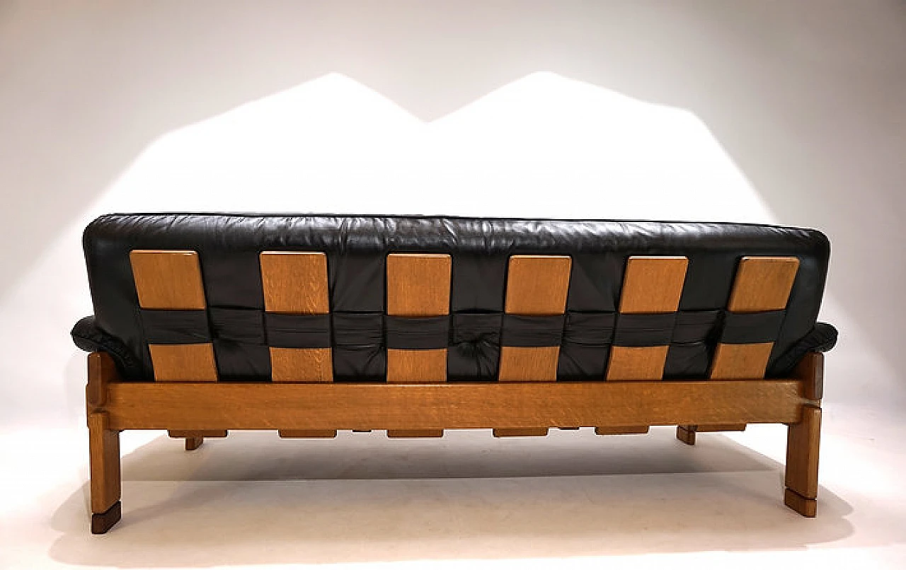 Solid oak and black leather three-seater sofa, 1960s 5