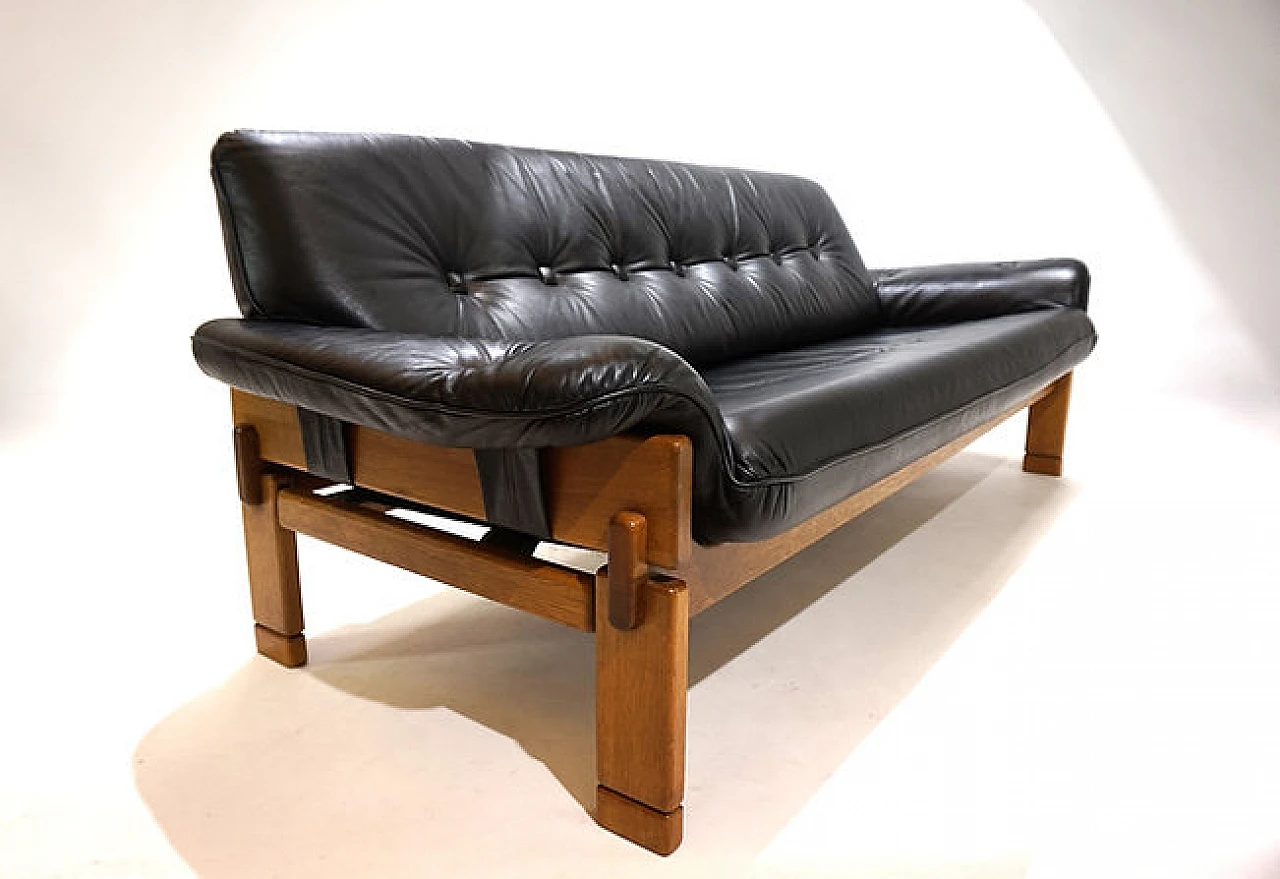 Solid oak and black leather three-seater sofa, 1960s 8