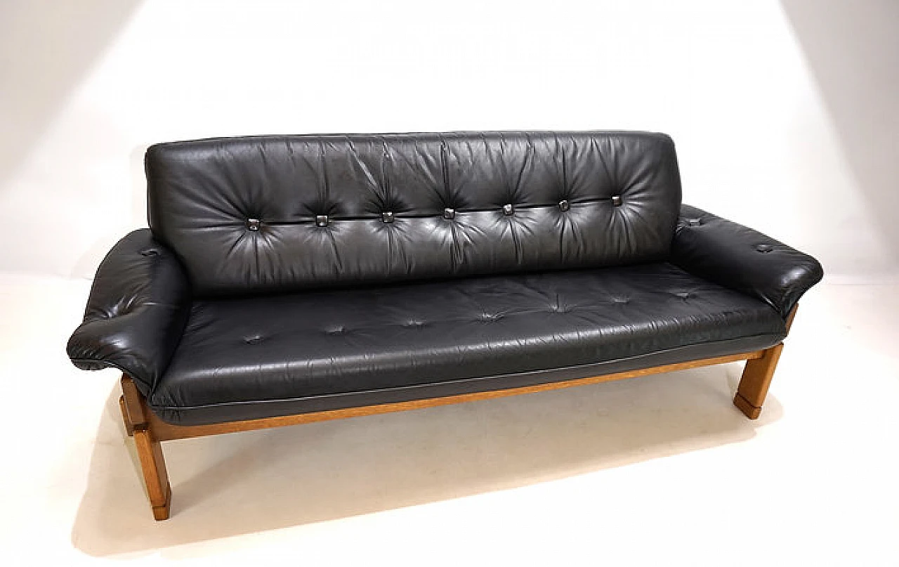 Solid oak and black leather three-seater sofa, 1960s 16