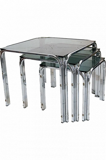 3 Nesting tables in chromed metal and smoked glass, 1970s