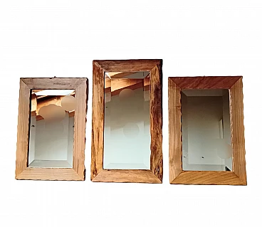 3 Mirrors with bevelled glass and carved wooden frame, 1980s