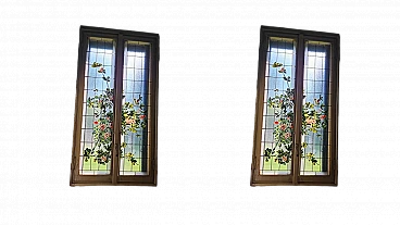 Pair of stained glass windows with hand-painted frames