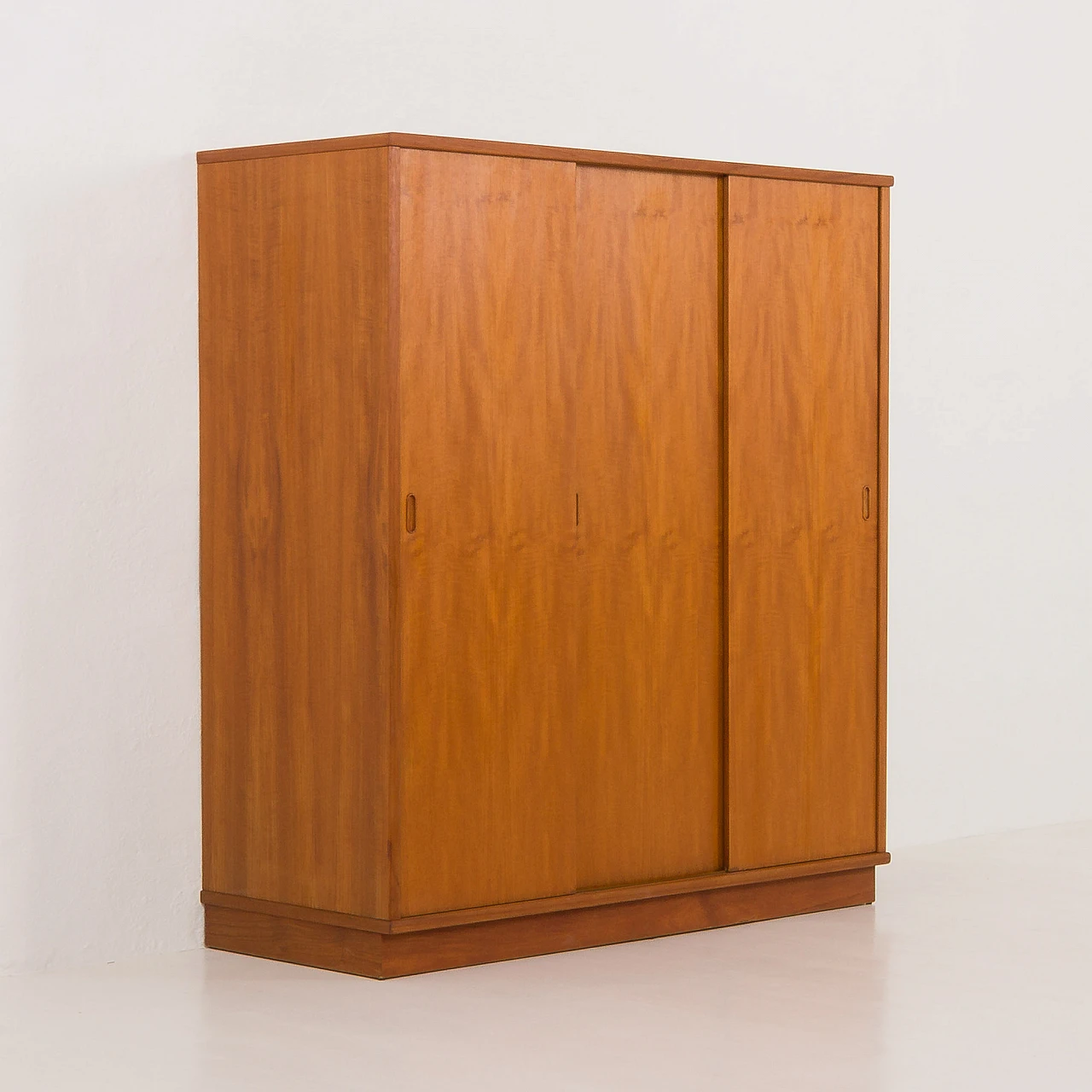 Danish teak wardrobe with three sliding doors, 1970s 1