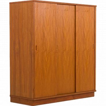 Danish teak wardrobe with three sliding doors, 1970s