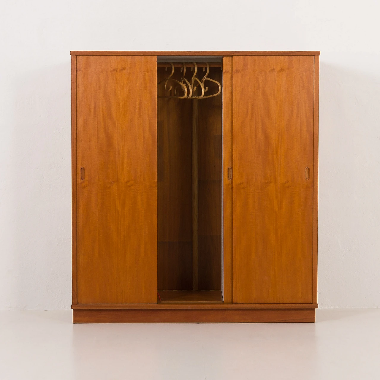 Danish teak wardrobe with three sliding doors, 1970s 9