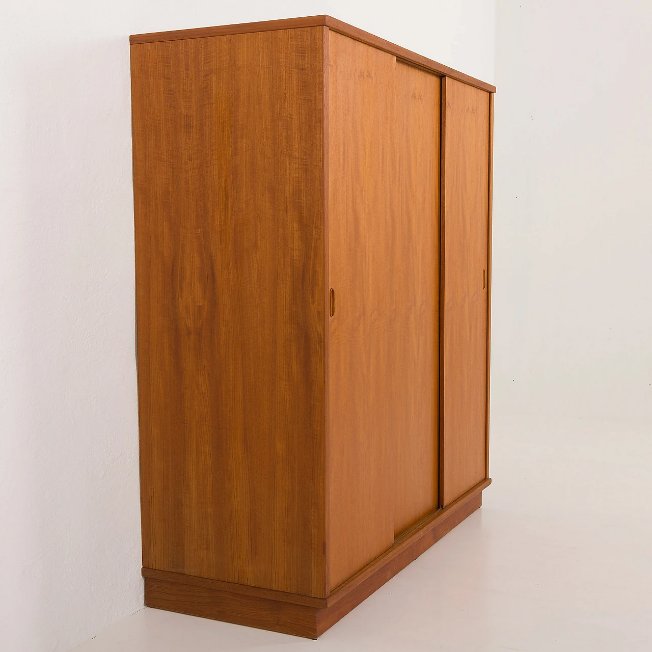 Danish teak wardrobe with three sliding doors, 1970s 17