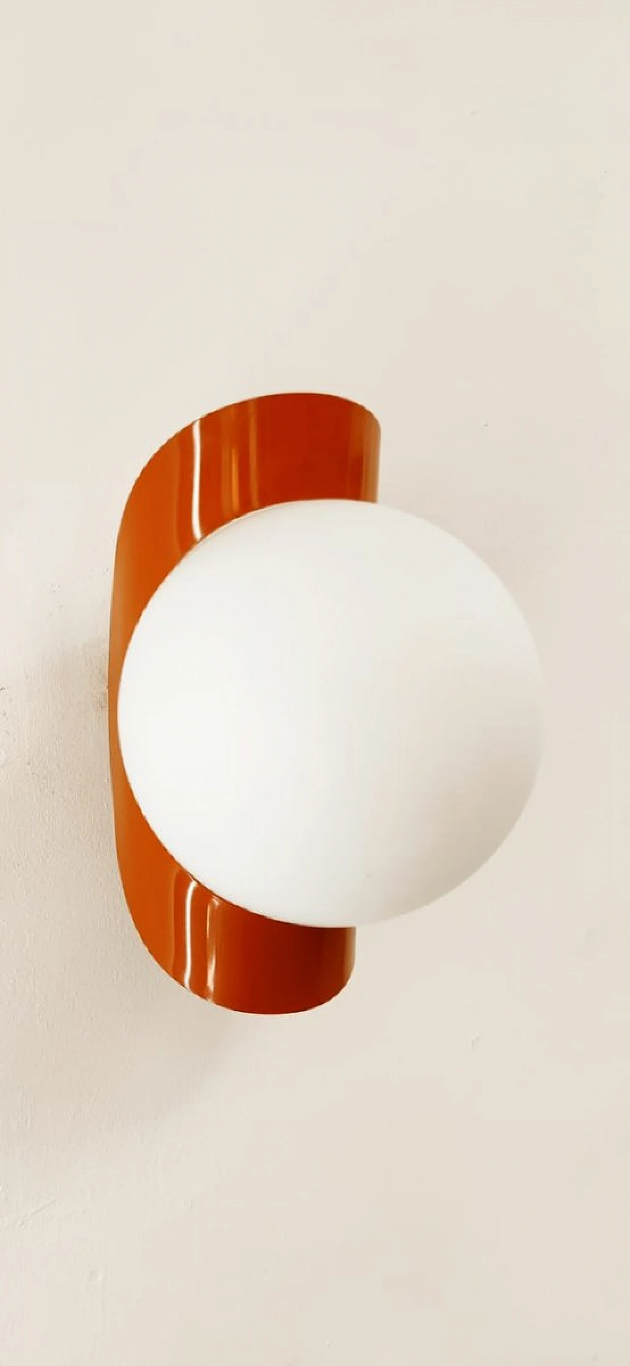 Wall light with glass sphere & orange metal band, 1970s 1