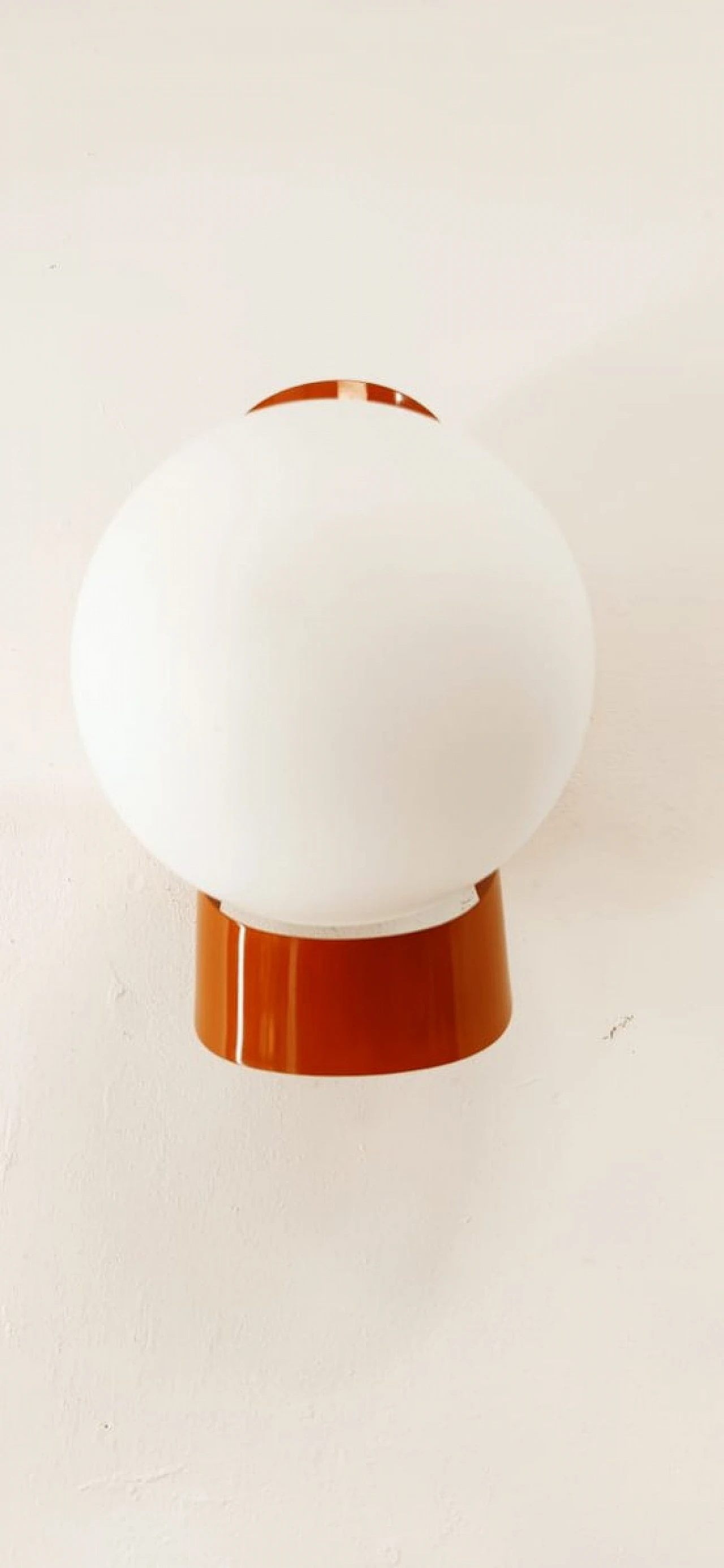 Wall light with glass sphere & orange metal band, 1970s 2