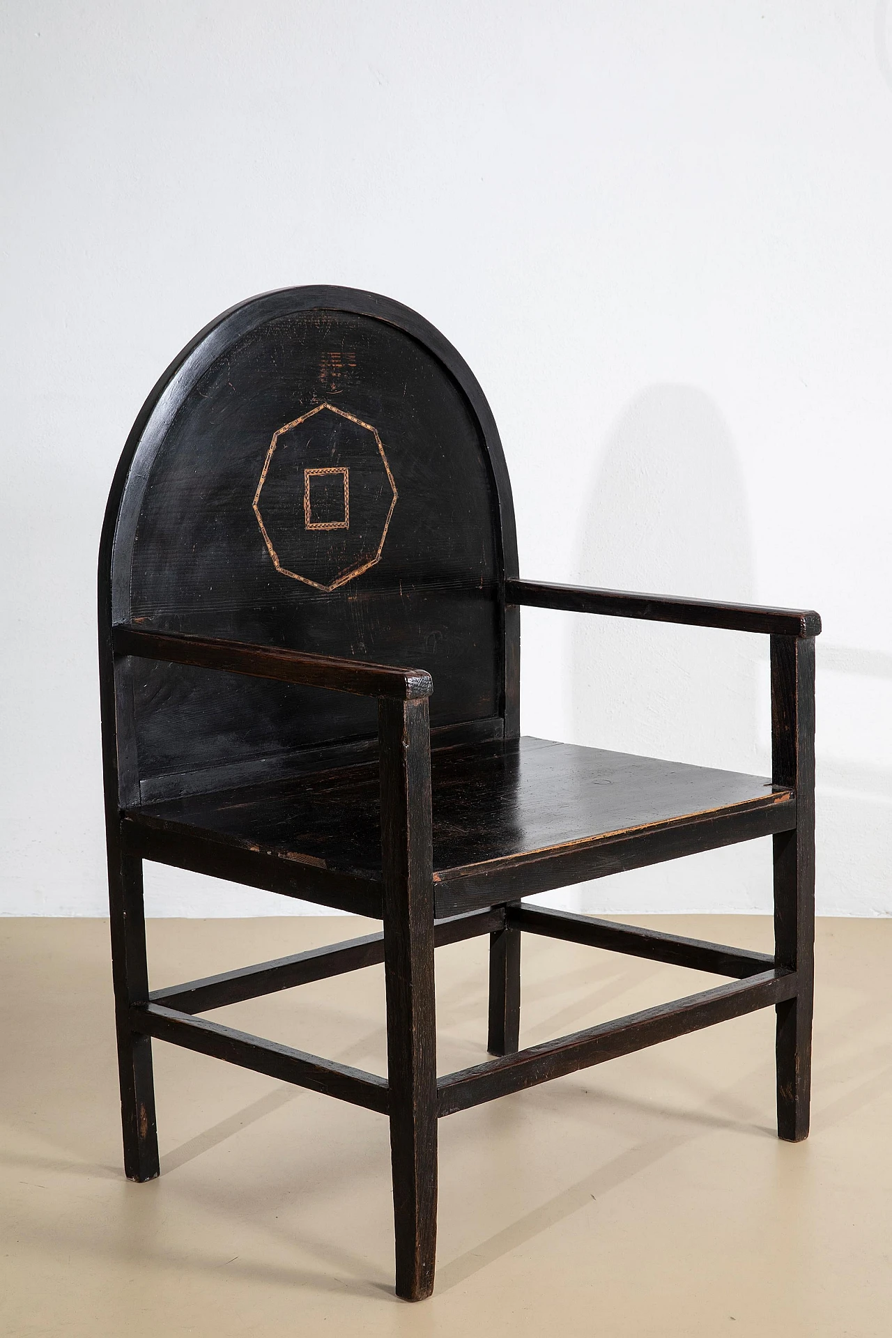 Pair of ebonised larch armchairs with hexagonal carvings, 1920s 9