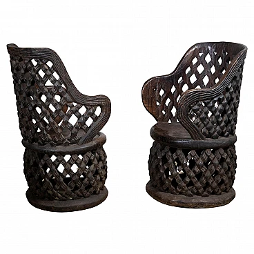 Pair of African carved wooden thrones of the Bamileké, 1980s