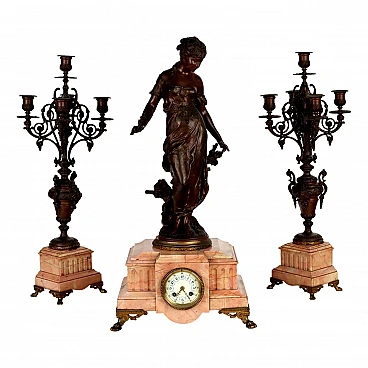 Pink marble & antimony clock and candelabras triptych, 19th century