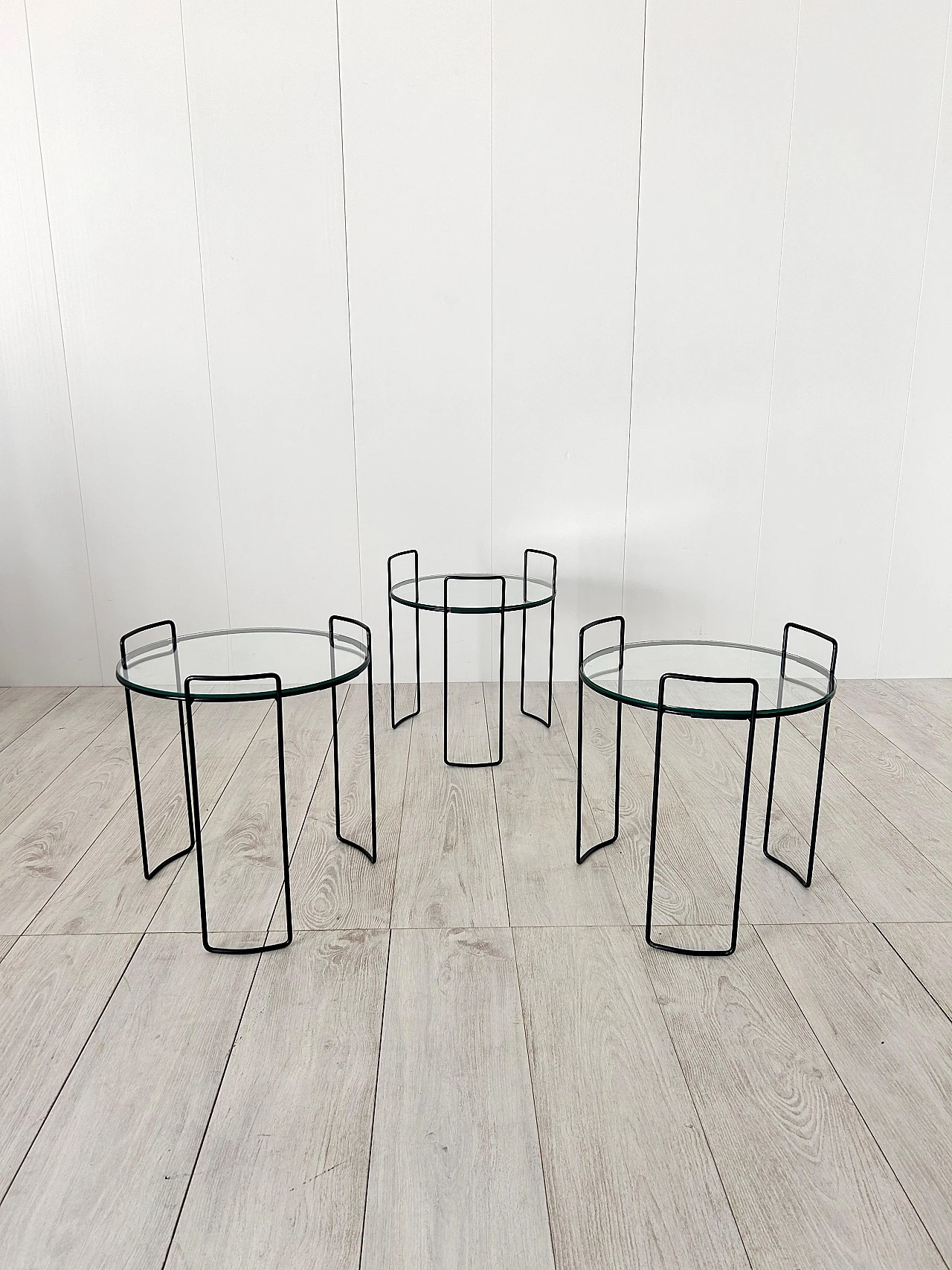 3 Round nesting tables in lacquered metal and glass, 1970s 6