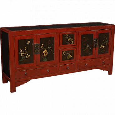 Chinese sideboard in red exotic wood with painted floral motifs