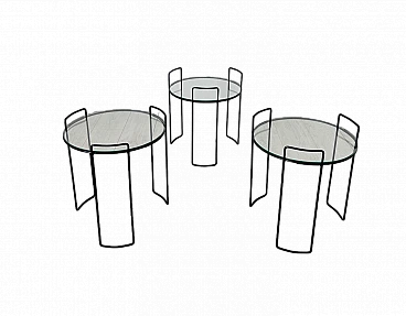 3 Round nesting tables in lacquered metal and glass, 1970s