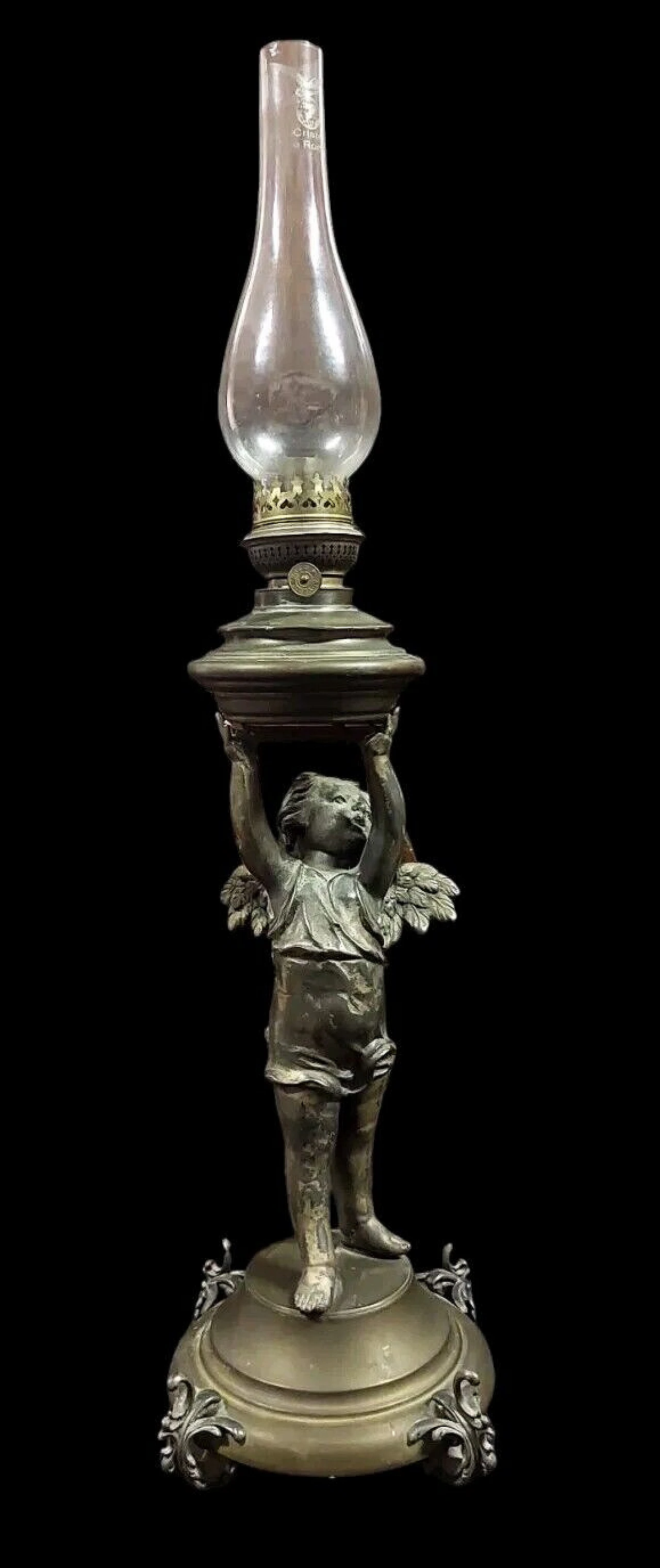 Antimony and brass oil lamp with winged putto, 19th century 3