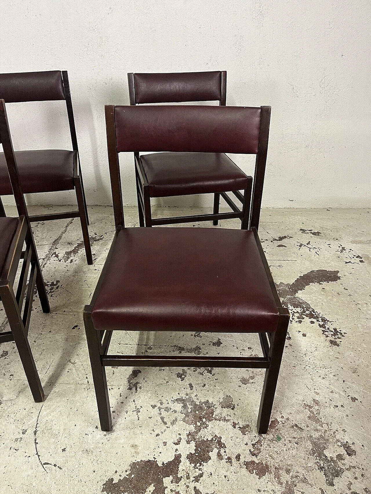 6 Chairs in rosewood and burgundy leather, 1960s 6