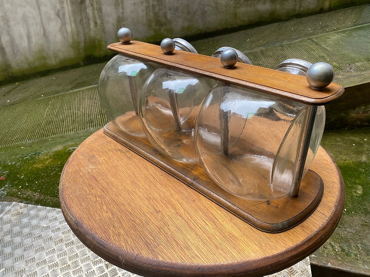 3 Glass cookie jars on wood stand, 1930s 5