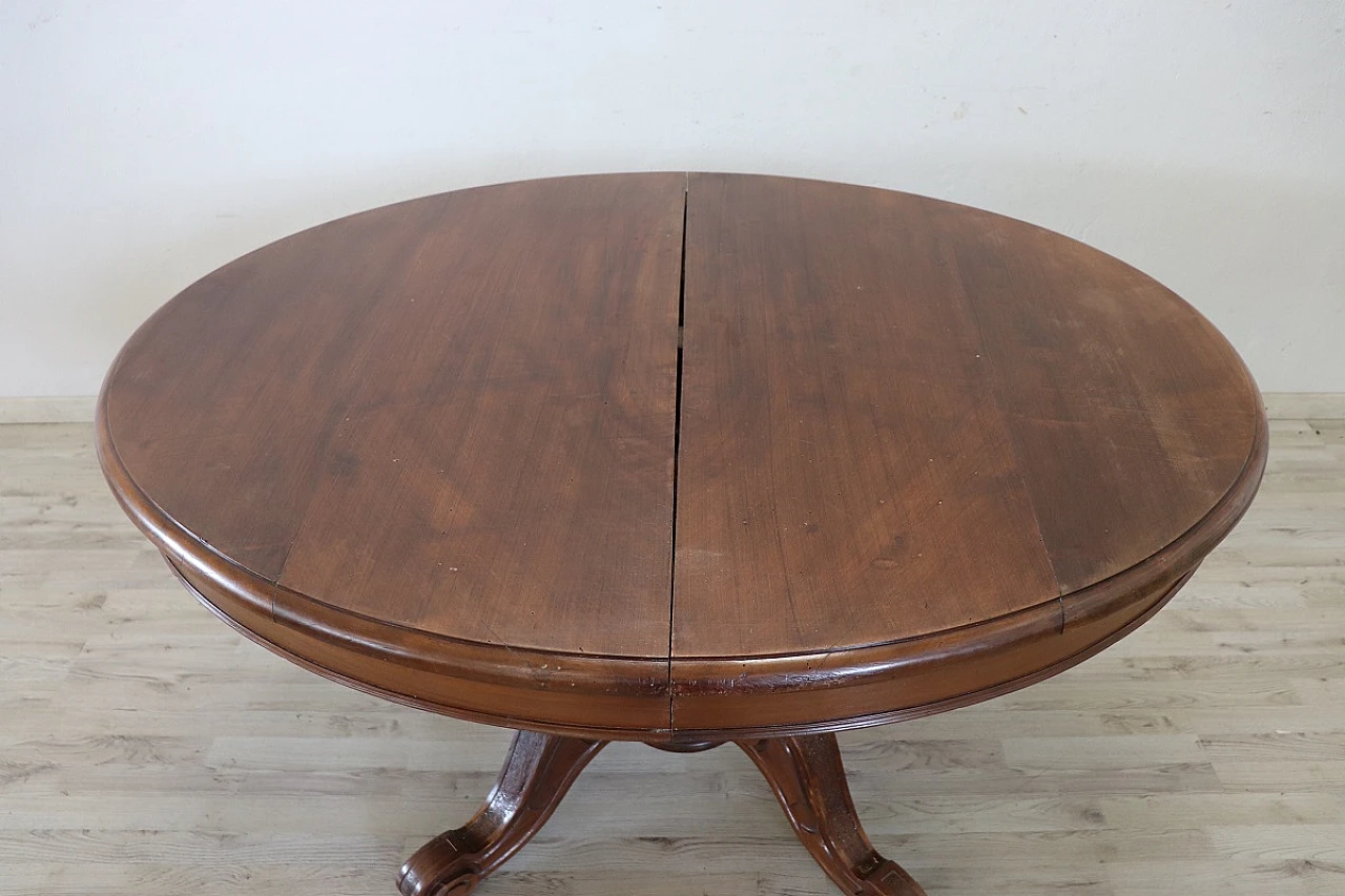 Walnut extensible oval dining table, 19th century 11