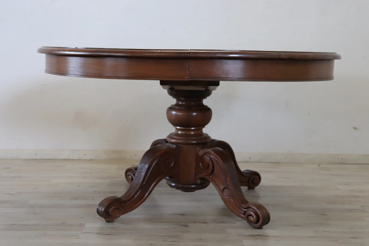 Walnut extensible oval dining table, 19th century 12