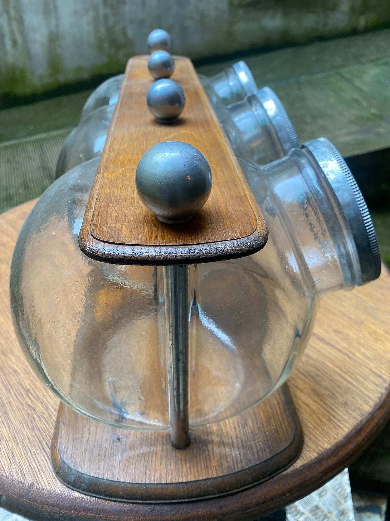 3 Glass cookie jars on wood stand, 1930s 7