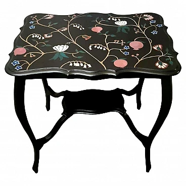 Chippendale style tea table in ebonized wood with flower motifs