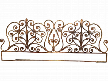 Wrought iron headboard painted with gold highlights, 19th century