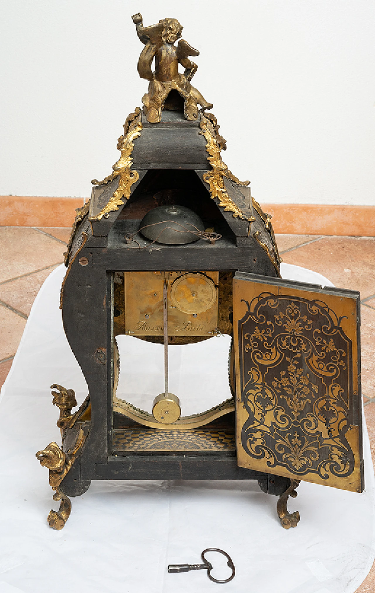 Cartel wall clock by Denis Masson, 18th century 10