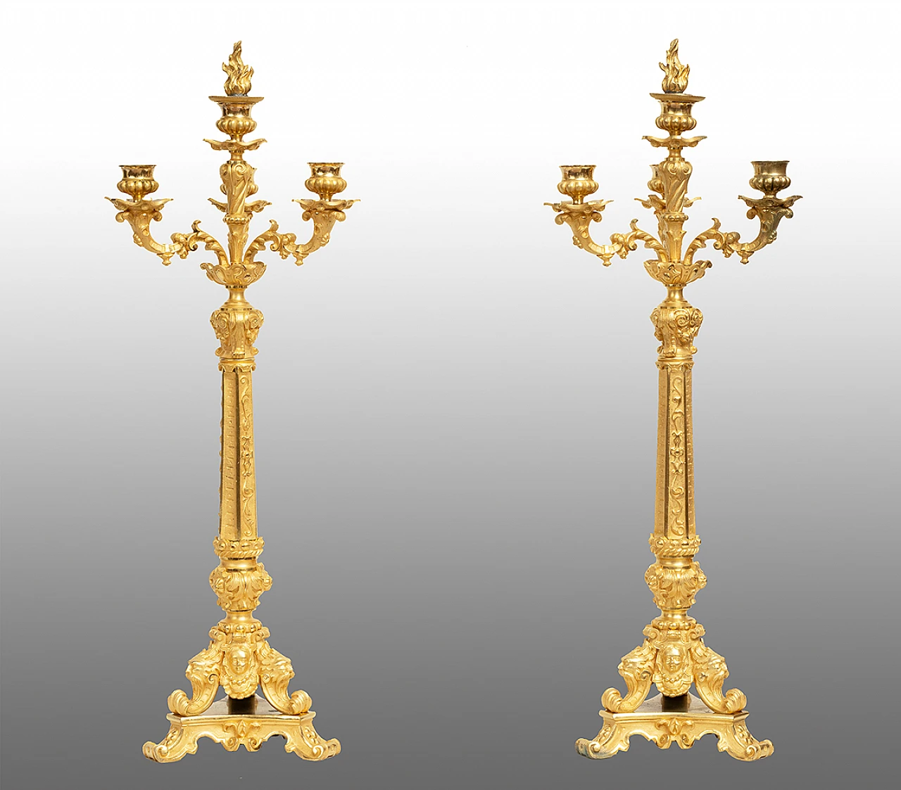 Pair of gilded bronze Charles X candle holders, early 19th century 1