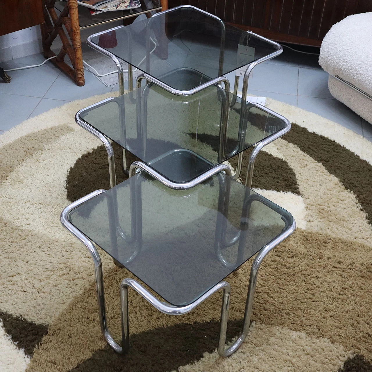 3 Coffee tables in smoked glass & chromed metal, 1970s 2