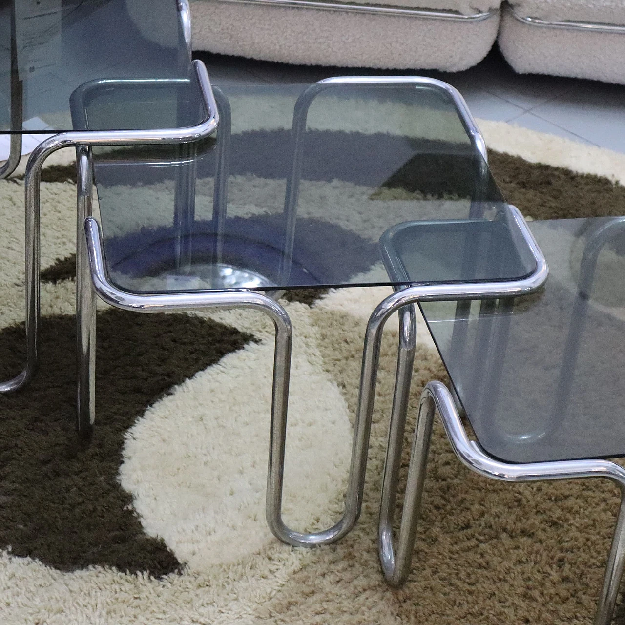 3 Coffee tables in smoked glass & chromed metal, 1970s 3