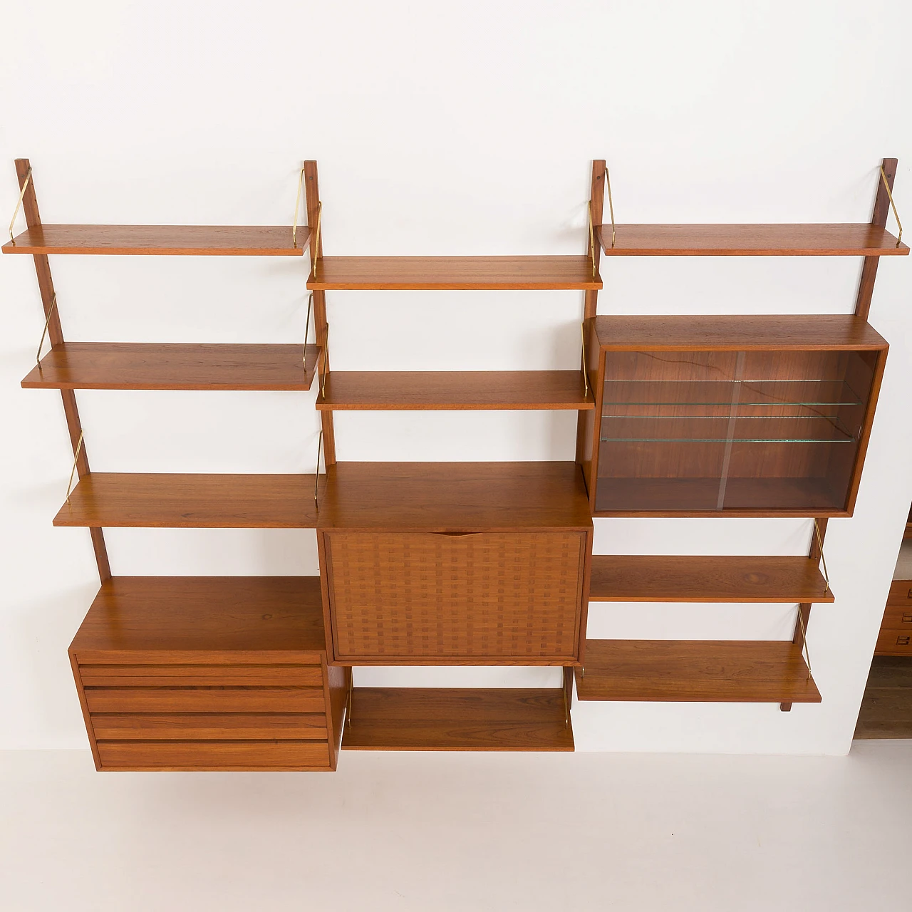 Modular teak wall unit with hidden desk by P. Cadovius for Cado, 1960s 10