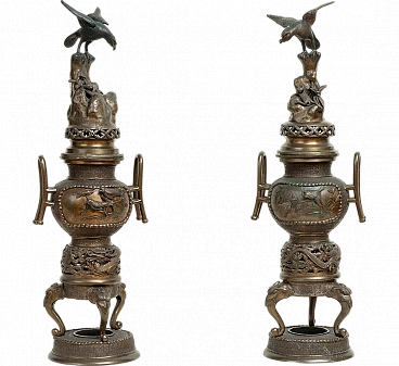 Pair of patinated antimony smoke-burning vases, early 20th century