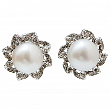 Pair of 14 karat white gold earrings with douth-sea pearl & diamonds