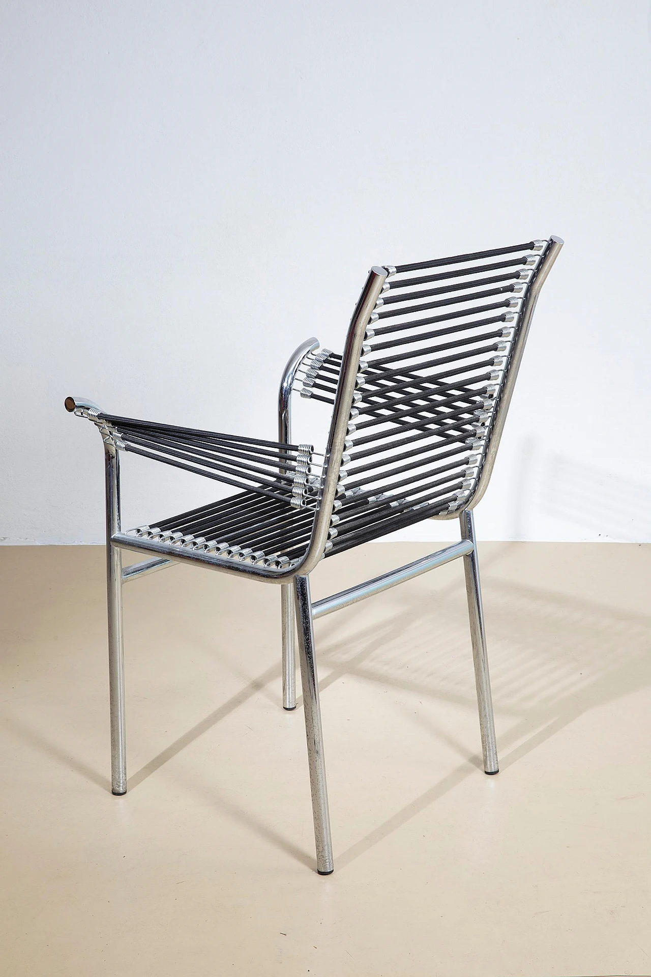 Steel and elastic rope chair by Renè Herbst, 1970s 5