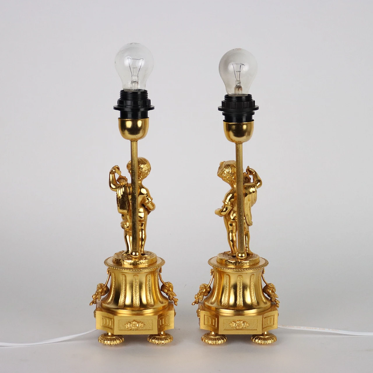 Pair of gold plated bronze table lamps by F.B.A.I. 9