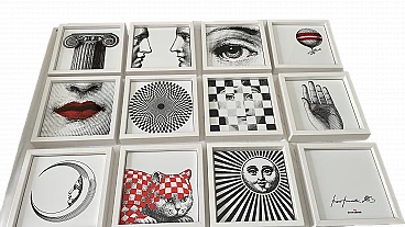 12 Ceramic frameworks with wooden frames by Fornasetti, 2000s