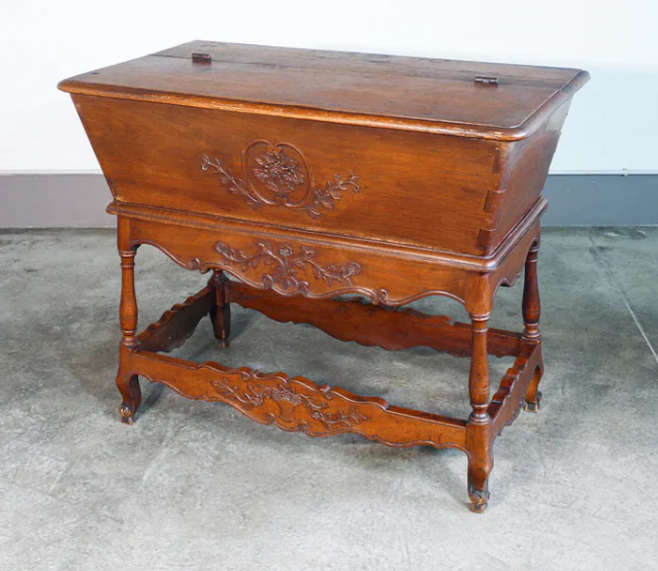 Walnut sideboard with base decorated in bas-relief, 19th century 1