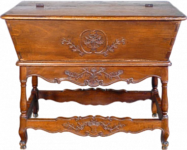 Walnut sideboard with base decorated in bas-relief, 19th century