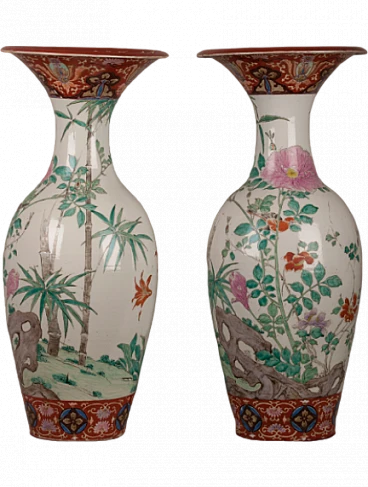 Pair of porcelain trumpet vases with floral motifs, 19th century