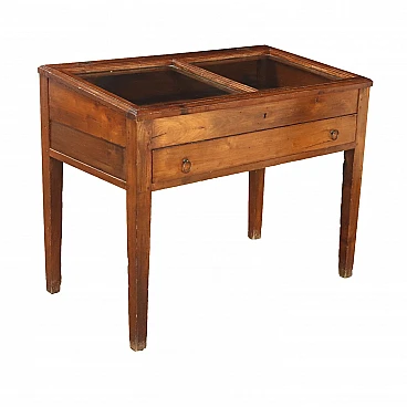 Stained poplar table with drawer and glass case, 19th century