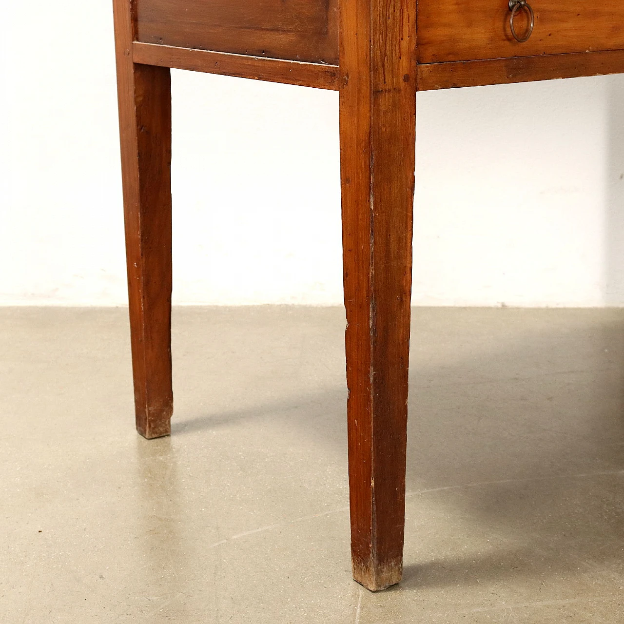 Stained poplar table with drawer and glass case, 19th century 7