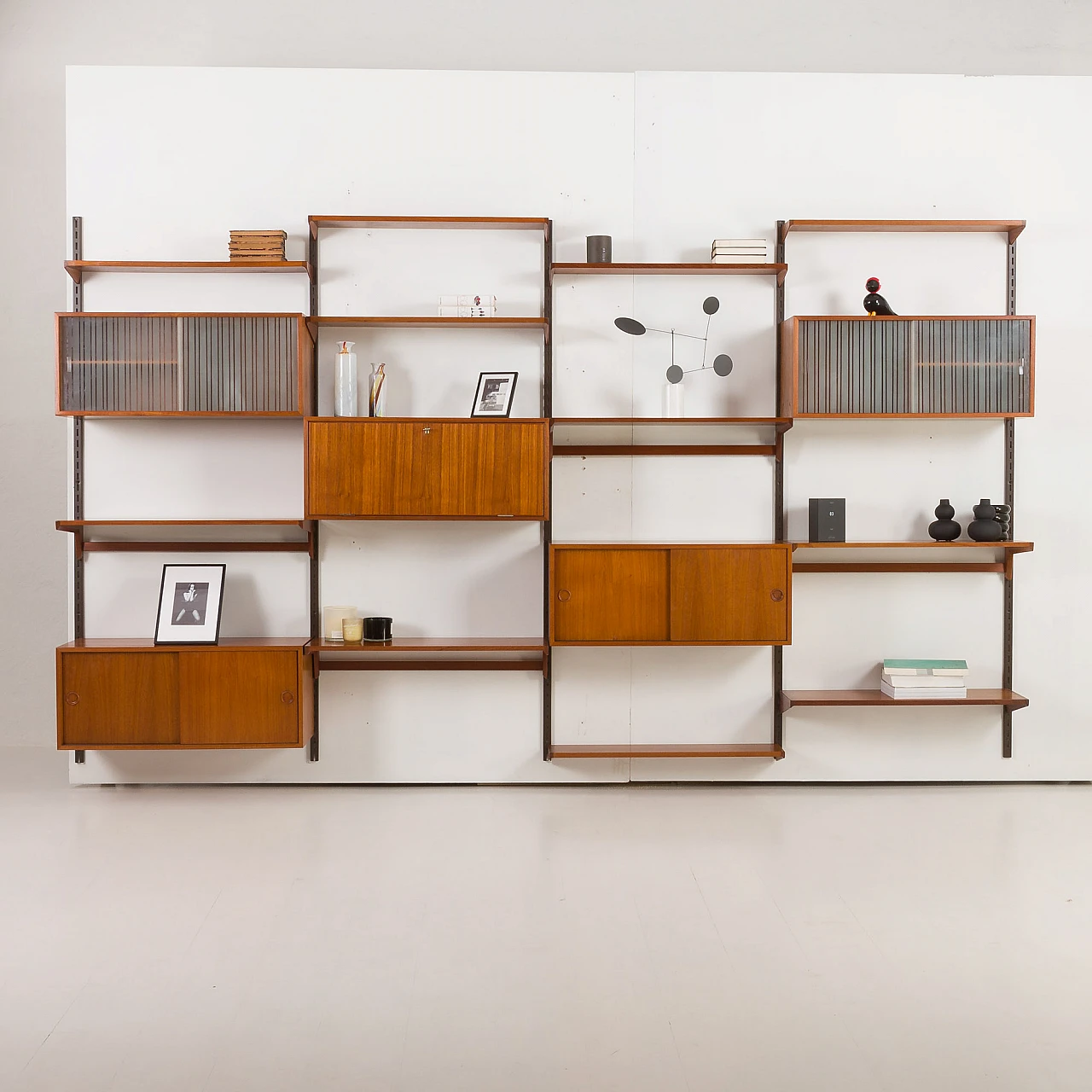 Four-bay teak wall unit by K. Kristiansen for FM Mobler, 1960s 2