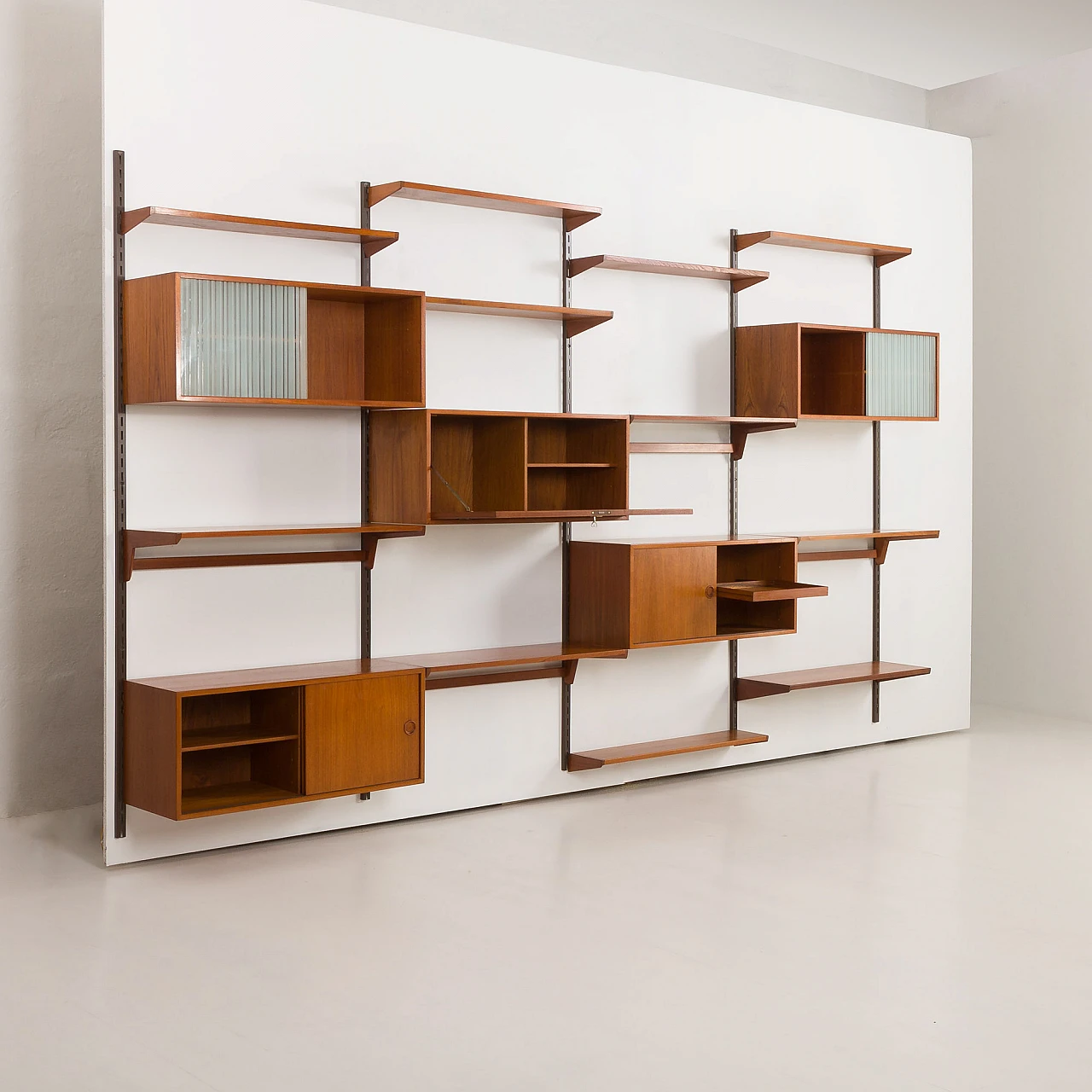 Four-bay teak wall unit by K. Kristiansen for FM Mobler, 1960s 3